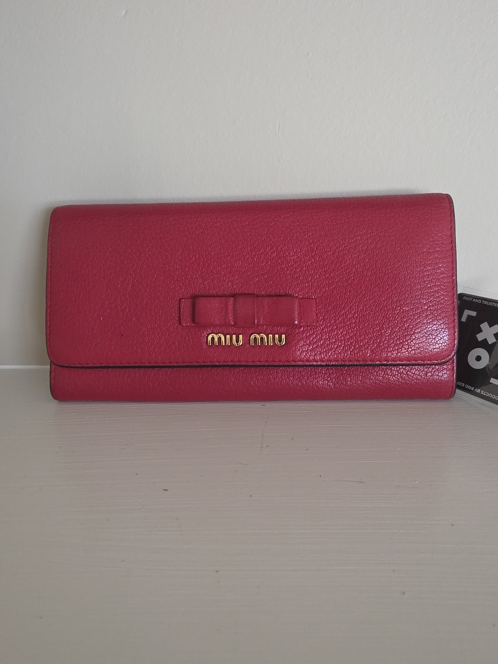 Miu Miu Red Leather Bow Continental Wallet with Gold Logo -Authenticated